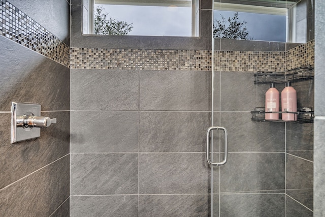 bathroom featuring an enclosed shower