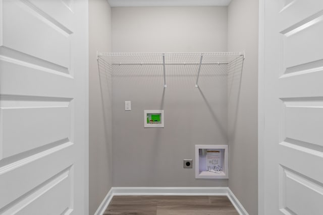 washroom with washer hookup, electric dryer hookup, and wood-type flooring