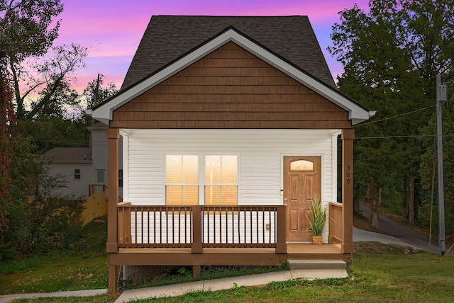 view of front of property featuring covered porch