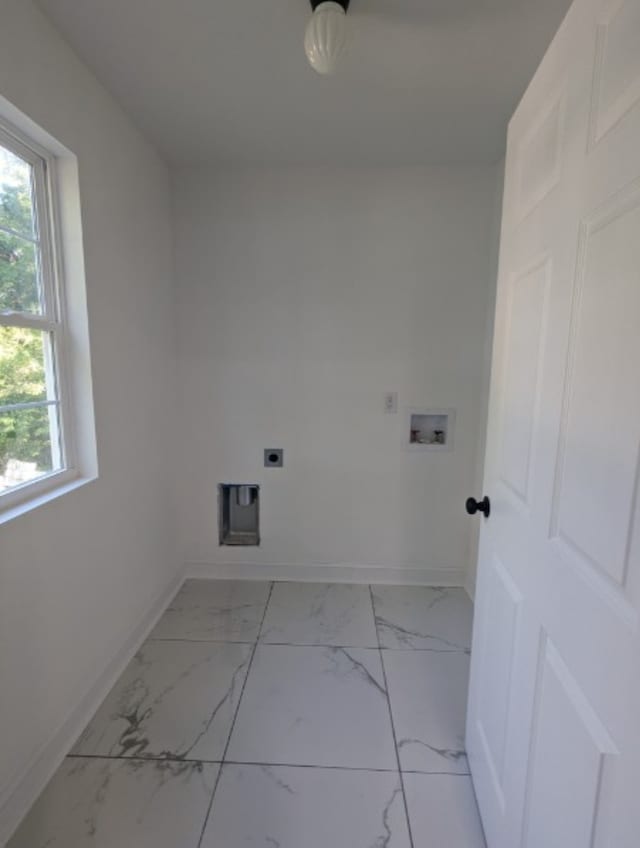 washroom with washer hookup and hookup for an electric dryer