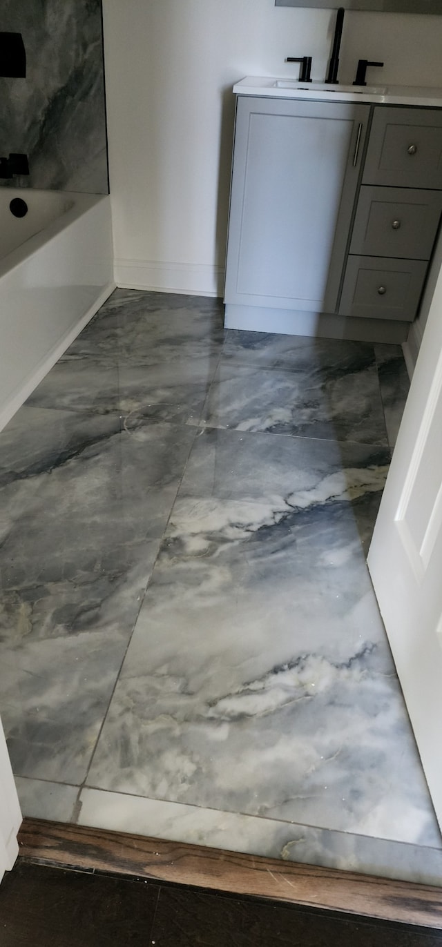 bathroom featuring sink and bathtub / shower combination