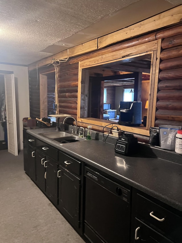 kitchen with rustic walls, dishwasher, sink, light colored carpet, and a textured ceiling