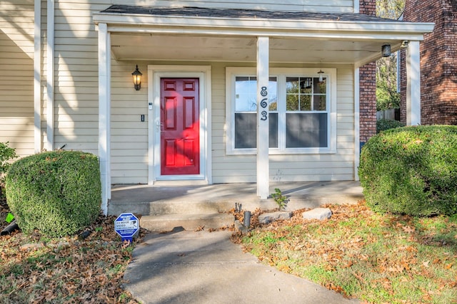 property entrance featuring covered porch