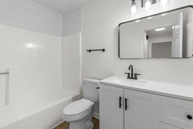 full bathroom with shower / bathing tub combination, vanity, and toilet