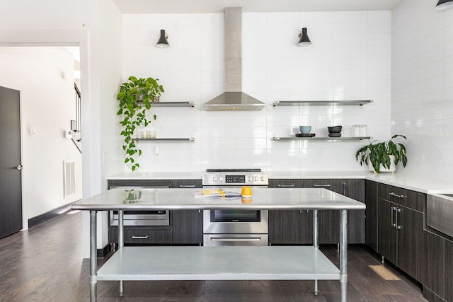 kitchen featuring open shelves, stainless steel electric stove, decorative backsplash, wall chimney range hood, and modern cabinets