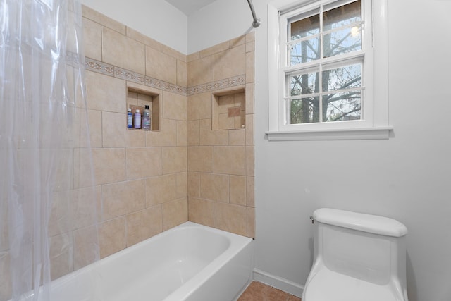 bathroom with shower / bath combination with curtain