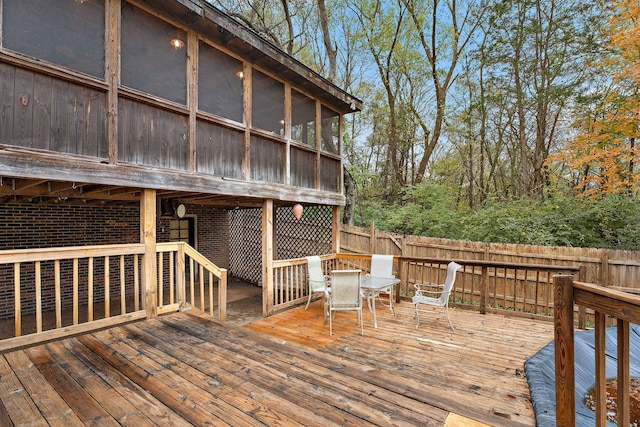 deck with a sunroom