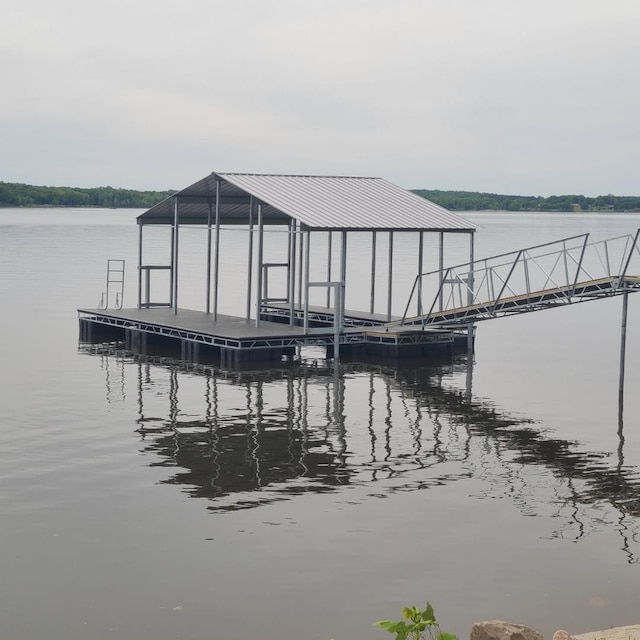 view of dock with a water view