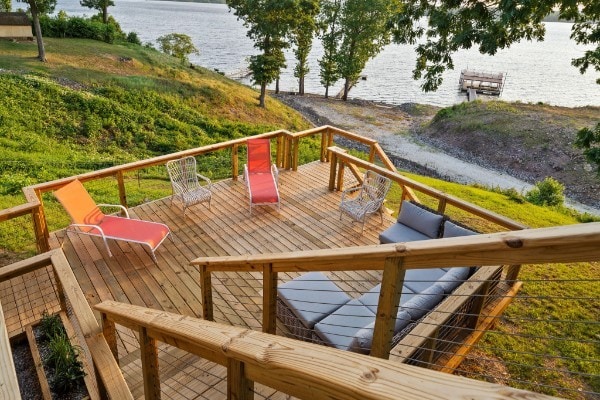 wooden deck with a water view