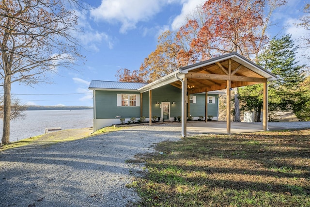 exterior space with a water view