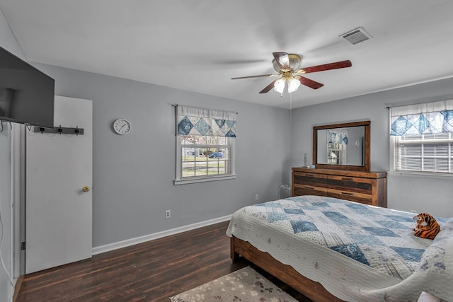 bedroom featuring ceiling fan and dark hardwood / wood-style flooring