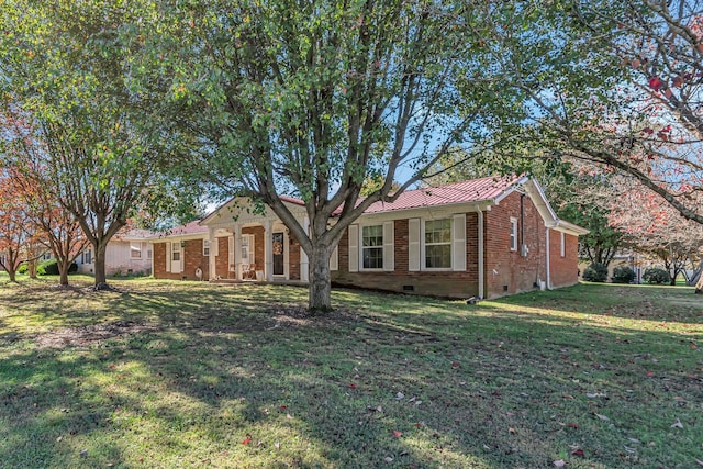 single story home featuring a front yard