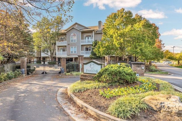 2027 Stokes Ln, Nashville, TN 37215 - multi unit property with a gate, driveway, and a chimney