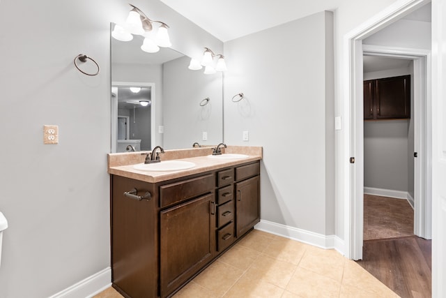 bathroom featuring vanity and hardwood / wood-style flooring