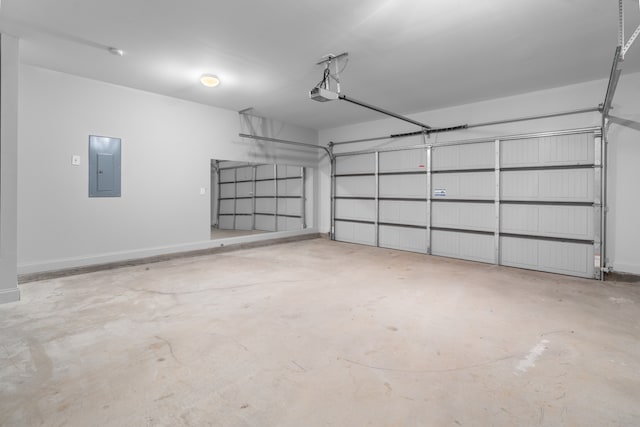 garage with electric panel and a garage door opener