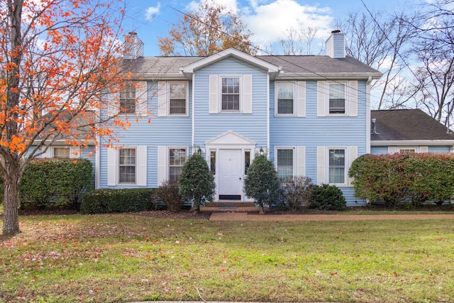 view of front of property with a front lawn