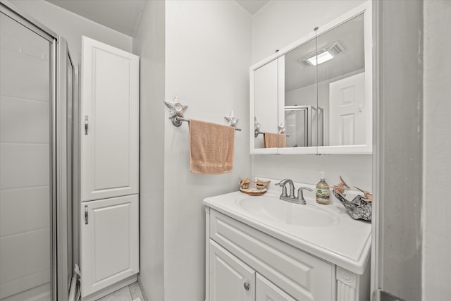 bathroom with vanity and walk in shower