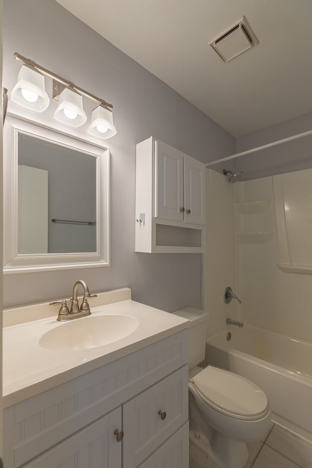 full bathroom featuring bathtub / shower combination, vanity, tile patterned flooring, and toilet