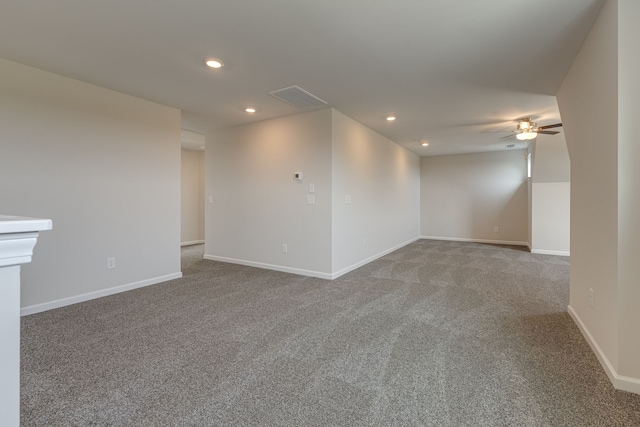 empty room with carpet floors and ceiling fan