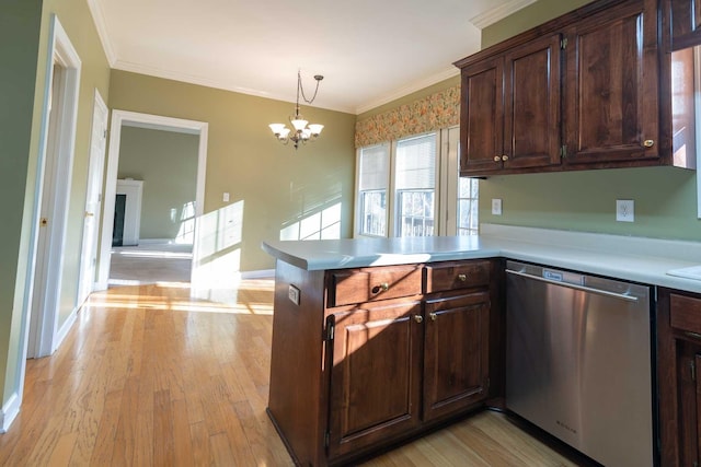 kitchen with kitchen peninsula, light wood-type flooring, pendant lighting, a notable chandelier, and dishwasher