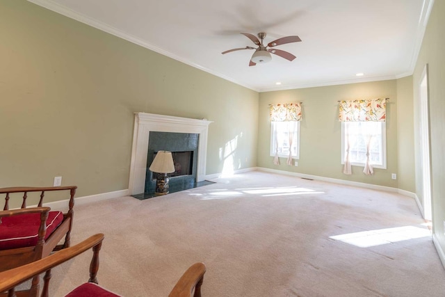 living room featuring crown molding, ceiling fan, and light carpet