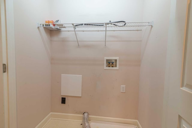 washroom with hookup for an electric dryer and hookup for a washing machine