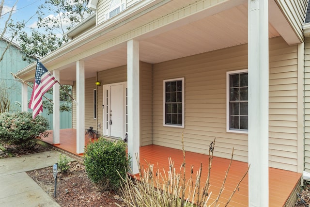 entrance to property with a porch