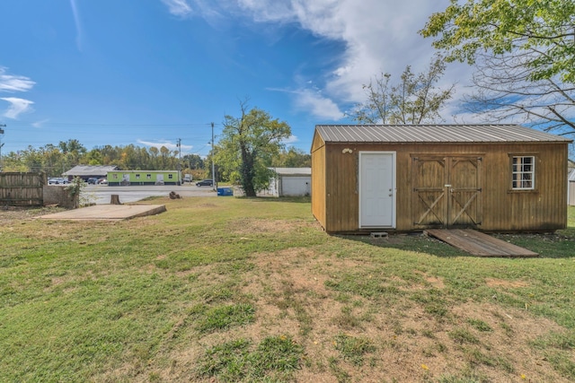 view of yard with a storage shed