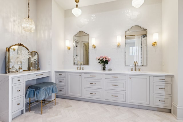 bathroom with parquet flooring and vanity