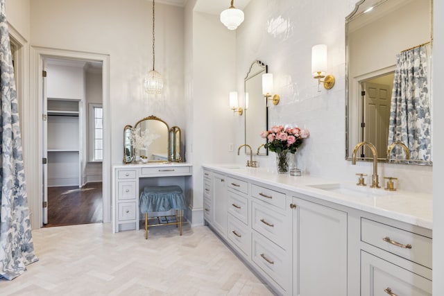 bathroom with hardwood / wood-style floors, vanity, and tasteful backsplash