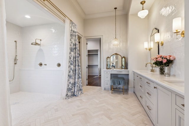 bathroom featuring parquet flooring, a tile shower, vanity, and ornamental molding