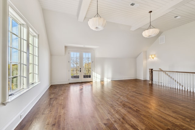 unfurnished living room featuring vaulted ceiling with beams, dark hardwood / wood-style floors, wood ceiling, and french doors