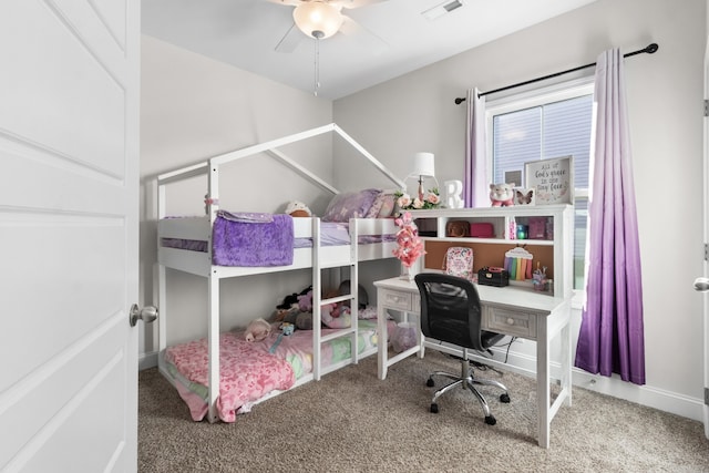 bedroom with ceiling fan and carpet floors