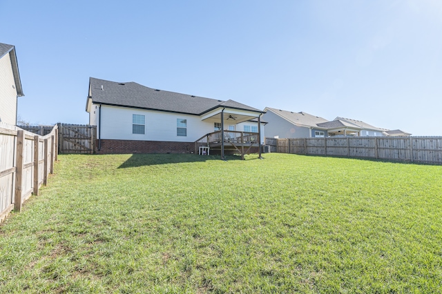 view of yard with a deck