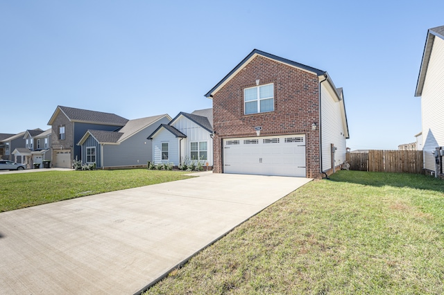 view of front property with a garage and a front lawn