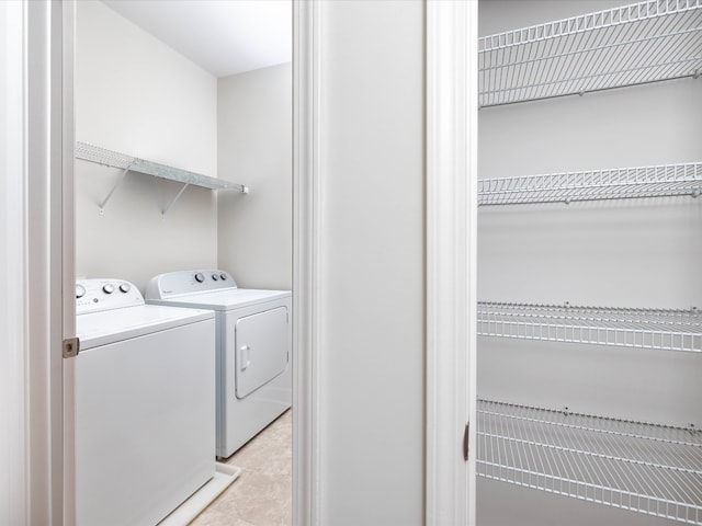 washroom with separate washer and dryer