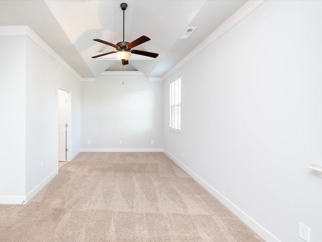 carpeted empty room featuring vaulted ceiling and ceiling fan