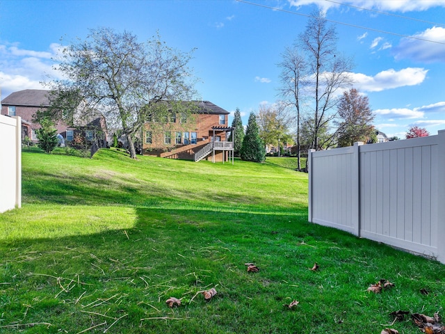 view of yard featuring a deck