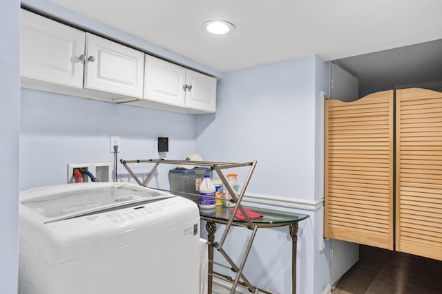 laundry area with washer / clothes dryer and cabinets