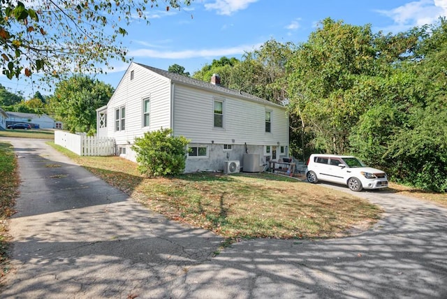 view of front facade with ac unit and cooling unit