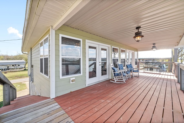 wooden terrace featuring french doors