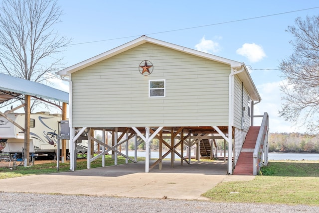 exterior space with a carport