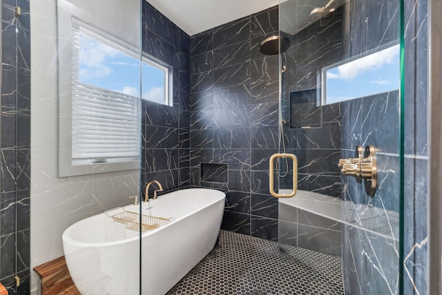 bathroom with tile walls and plus walk in shower