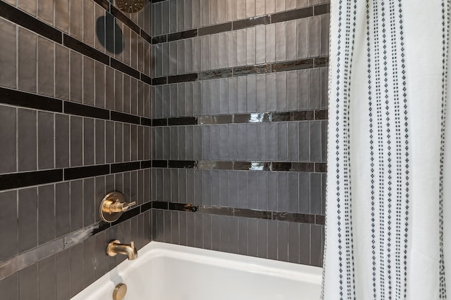 bathroom featuring shower / bathtub combination with curtain