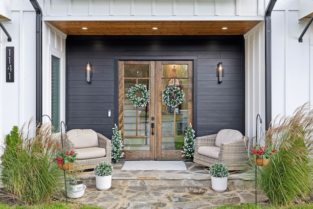 view of exterior entry featuring french doors