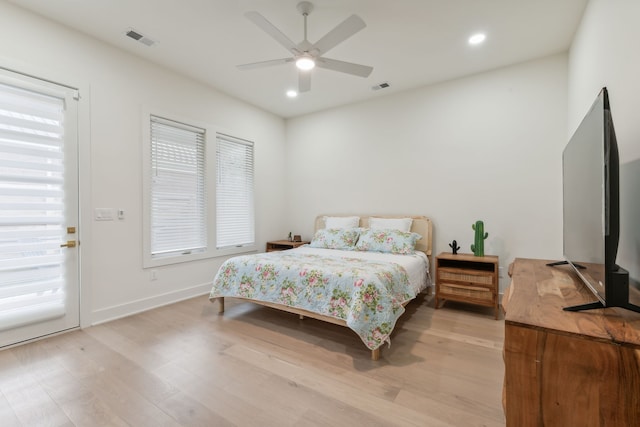 bedroom featuring access to outside, ceiling fan, and light hardwood / wood-style floors