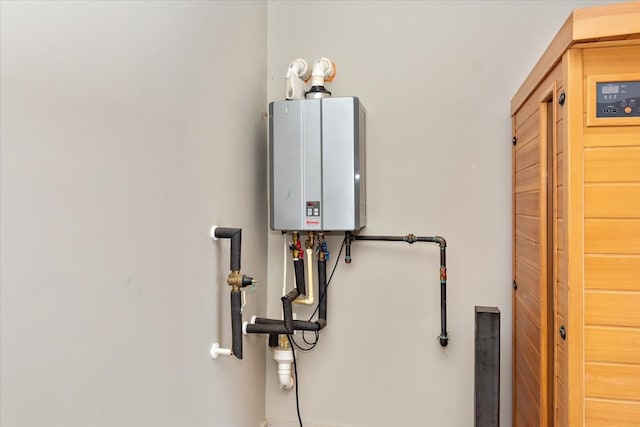 utility room with water heater