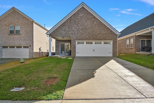 view of property with a front yard and a garage