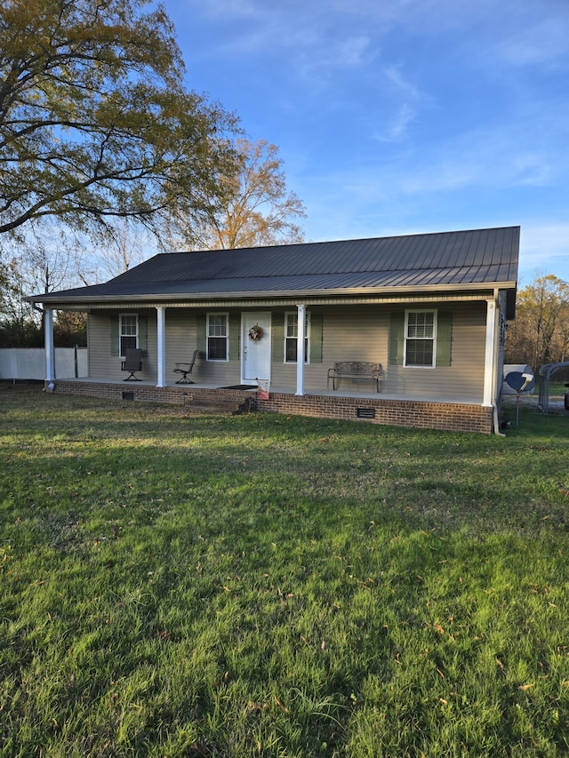 ranch-style home with a front yard