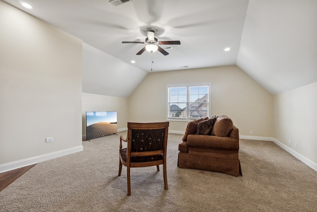 sitting room featuring carpet floors, vaulted ceiling, and ceiling fan